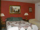 Queen and a twin bed in the Redstone Room.